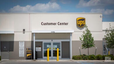 Photo of a the front entrance to a UPS Customer Service building.