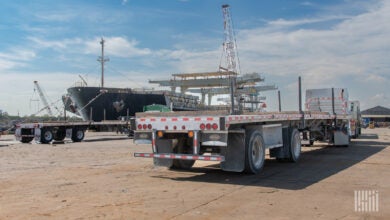 Flatbed trucks waiting to be loaded at the Port of Houston