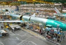 Fuselage and other components of a 777 jetliner are put together at a Boeing assembly plant.