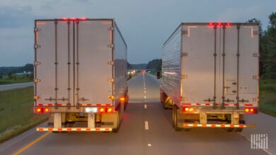 Trucks on highway at night