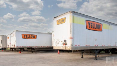 Yellow trailers parked at a Houston terminal