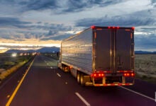 Truck on highway at night