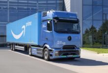 A picture of a Mercedes-Benz cabover truck with an Amazon Trailer