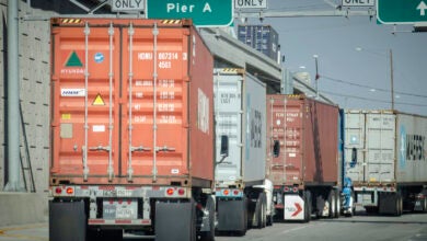 drayage trucks hauling containers into Port of Los Angeles