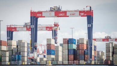 Cranes lifting containers at Port of Long Beach