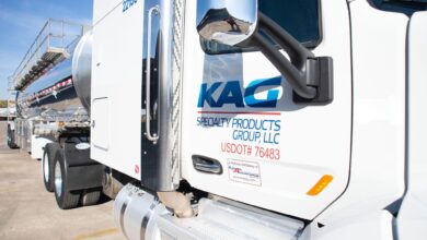 A picture of a KAG tractor pulling a liquid bulk trailer