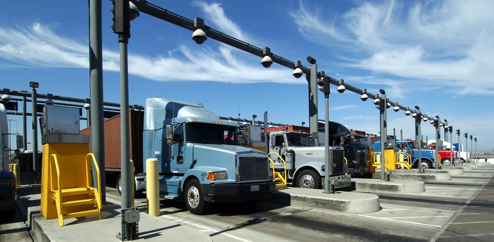  About 100 truck drivers at the Ports of Los Angeles and Long Beach have gone on strike to protest their status as independent truck drivers as well as the costs to comply with clean air regulations. 