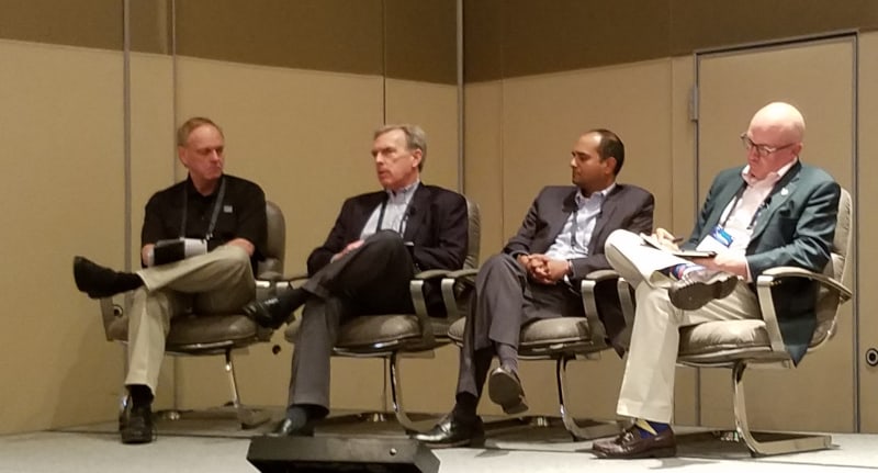  Panelists during a financial session listen as John Larkin, managing director at Stifel (second from left), speaks. Also on the panel, held at Transparency18, was Ravi Shanker of Morgan Stanley (to the right of Larkin) and Donald Broughton (right) of Broughton Capital. It was moderated by John Kingston, executive editor of FreightWaves. 