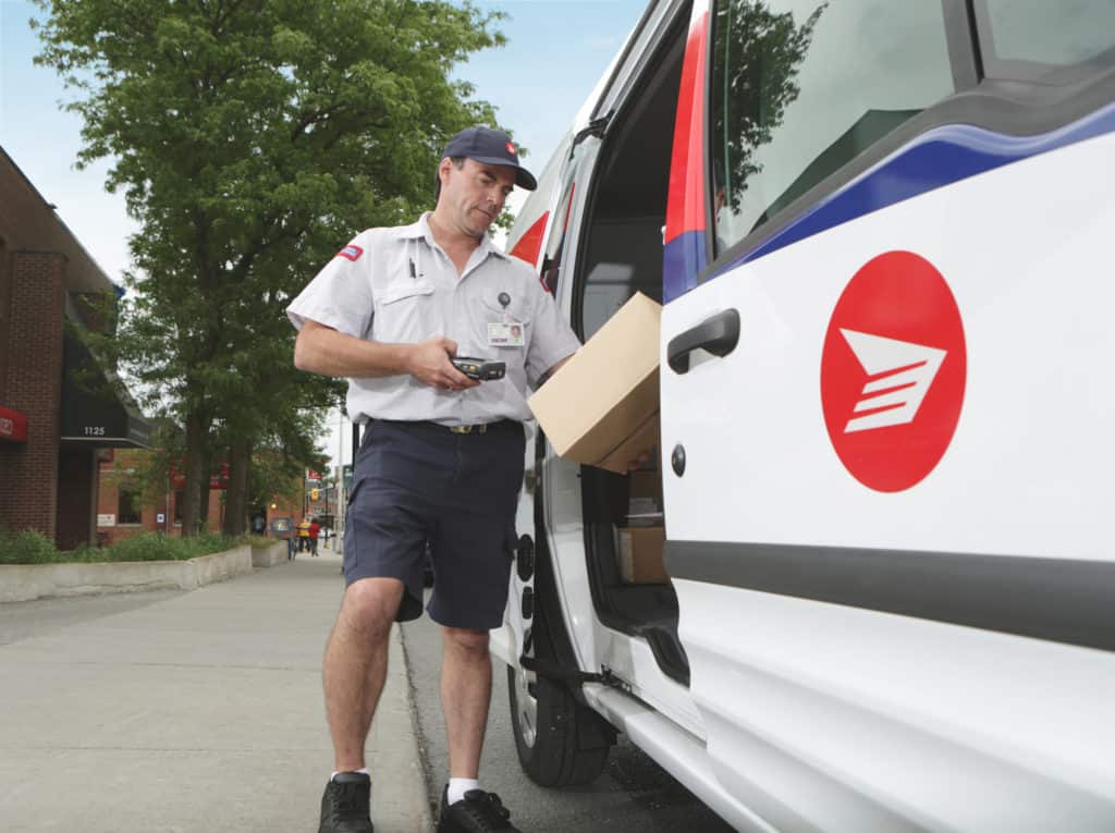 what does canada post workers make