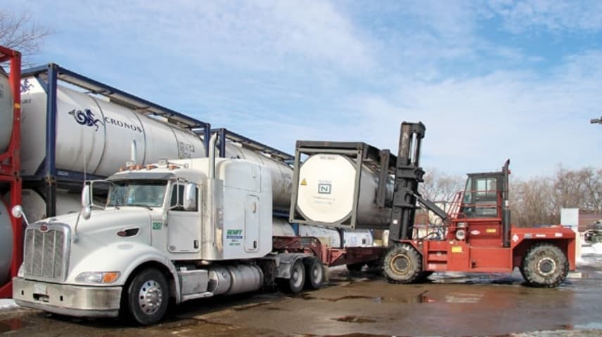 ISO container loaded on a Heniff trailer