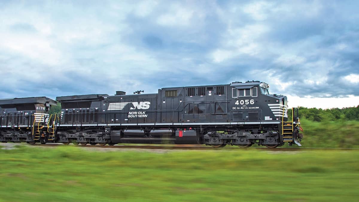 A train led by two Norfolk Southern engines.