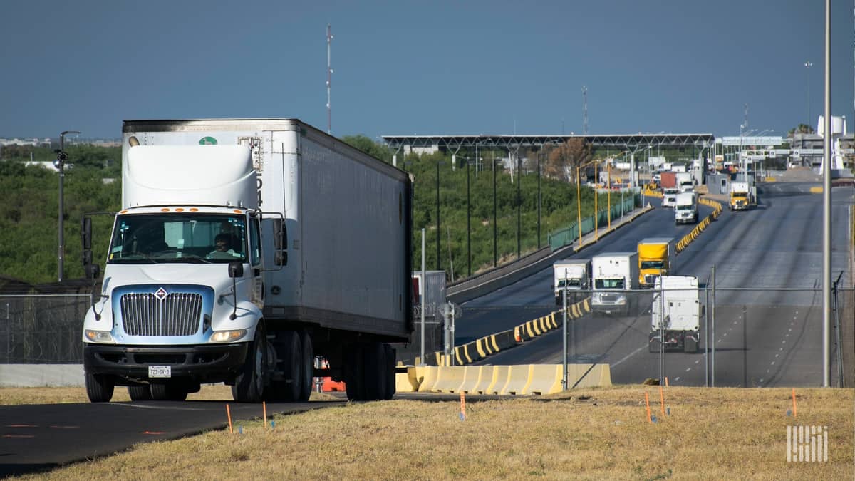 Trucks leaving a border inspection site.