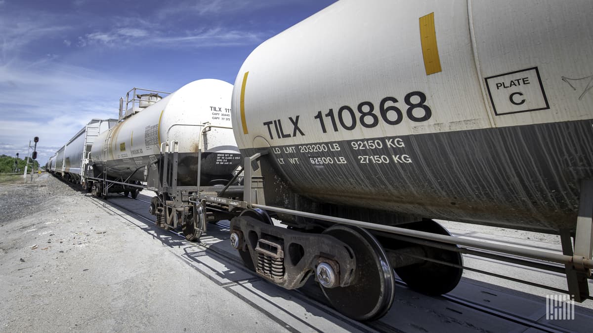 Railcars on a track stretch into the distance. Tank railcars carry a variety of petroleum/energy products.