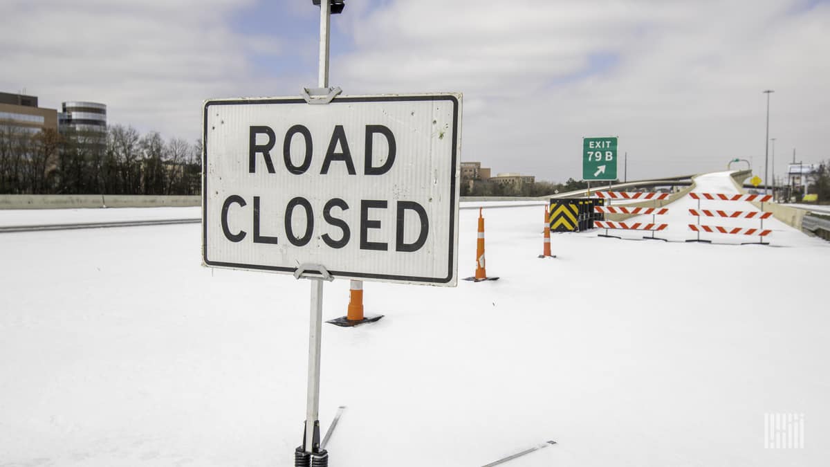 Closed I-45 north ramp in Conroe, Texas during snowstorm on Feb. 15,2021.