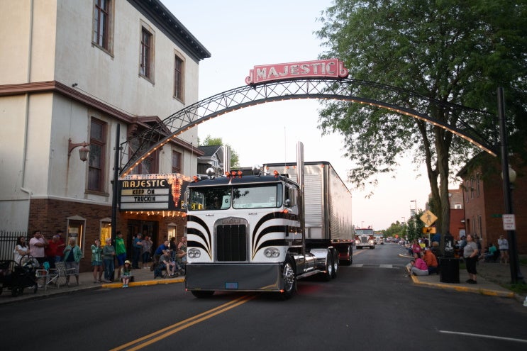 A black-and-white striped Kenworth K100 in a parade in Chillicothe, Ohio.