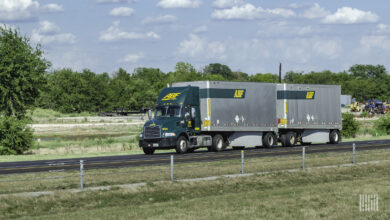 ABF tractor pulling two LTL trailers