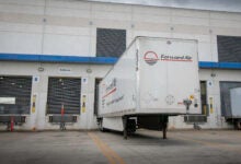 A white Forward Air trailer at a warehouse